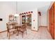 Casual dining area with glass-top table and access to the pool area at 6618 Abeydon Ct, Orlando, FL 32818