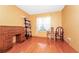 Bright home office features wood floors, built-in desk, and ample shelving at 6618 Abeydon Ct, Orlando, FL 32818