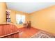 Home office with wood floors and a roll-top desk at 6618 Abeydon Ct, Orlando, FL 32818