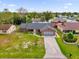 Aerial view of single Gathering home and driveway at 857 S Atmore Cir, Deltona, FL 32725