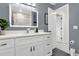 Clean bathroom with a vanity and a large mirror at 857 S Atmore Cir, Deltona, FL 32725