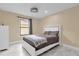 Bright bedroom with a double bed and large window at 857 S Atmore Cir, Deltona, FL 32725