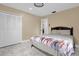Guest bedroom with a double bed and access to a hallway at 857 S Atmore Cir, Deltona, FL 32725