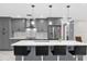 Spacious kitchen featuring gray shaker cabinets and a large kitchen island at 857 S Atmore Cir, Deltona, FL 32725