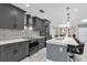 Modern kitchen with stainless steel appliances and a white quartz countertop at 857 S Atmore Cir, Deltona, FL 32725