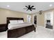 Spacious main bedroom with king-size bed and en-suite bathroom access at 857 S Atmore Cir, Deltona, FL 32725