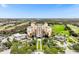 Luxury condo building with resort amenities and golf course views at 875 Assembly Ct, Reunion, FL 34747