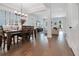 Dining room with a large wooden table and hardwood floors at 1018 Wilks Ave, Belle Isle, FL 32809