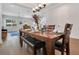 Formal dining room with a wooden table and bench seating at 1018 Wilks Ave, Belle Isle, FL 32809