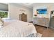 Main bedroom featuring large bed, dresser and TV at 1018 Wilks Ave, Belle Isle, FL 32809