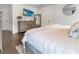Main bedroom with dresser and comfortable bedding at 1018 Wilks Ave, Belle Isle, FL 32809
