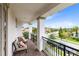 Private balcony with seating area and neighborhood view at 10279 Beechwood Ln, Orlando, FL 32832