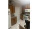 Kitchen with wood cabinets, granite countertops, and white appliances at 1241 Melontree Ct # 6, Gotha, FL 34734
