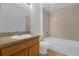 Clean bathroom with tub, toilet and vanity at 13658 Hidden Forest Cir, Orlando, FL 32828