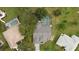 Aerial view showing house, pool, and surrounding landscape at 2934 Evans Dr, Kissimmee, FL 34758