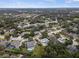 Aerial view of house and surrounding neighborhood, showing location and landscape at 369 Forest Park Cir, Longwood, FL 32779