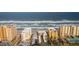 Aerial view of beachfront condo, showing its location near the ocean and other buildings at 3807 S Atlantic Ave # 2020, Daytona Beach, FL 32118