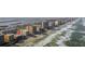 Aerial perspective highlighting the building's position along the beach and nearby amenities at 3807 S Atlantic Ave # 2020, Daytona Beach, FL 32118