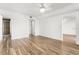 Primary bedroom featuring hardwood floors and access to bathroom at 3807 S Atlantic Ave # 2020, Daytona Beach, FL 32118