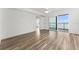 Hardwood floor bedroom with access to balcony and ocean view at 3807 S Atlantic Ave # 2020, Daytona Beach, FL 32118