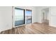 Bedroom with ocean view and sliding glass doors to balcony at 3807 S Atlantic Ave # 2020, Daytona Beach, FL 32118