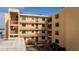 Condo building exterior view, showcasing multiple floors, balconies and parking area at 3807 S Atlantic Ave # 2020, Daytona Beach, FL 32118