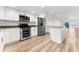 Modern kitchen with stainless steel appliances and granite countertops at 3807 S Atlantic Ave # 2020, Daytona Beach, FL 32118