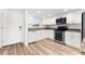 Modern kitchen with stainless steel appliances and granite countertops at 3807 S Atlantic Ave # 2020, Daytona Beach, FL 32118