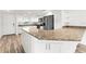 Modern kitchen with island, stainless steel appliances and granite countertops at 3807 S Atlantic Ave # 2020, Daytona Beach, FL 32118