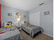 Bedroom with two twin beds and Mickey Mouse decor at 408 Miramar Avenue, Davenport, FL 33897