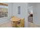 Small breakfast nook with round table and two chairs at 408 Miramar Avenue, Davenport, FL 33897