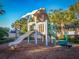playground with a slide and climbing structure at 408 Miramar Avenue, Davenport, FL 33897