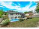 Large backyard with pool and home exterior at 664 Little Wekiva Rd, Altamonte Springs, FL 32714