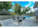 Landscaped backyard with firepit and pool at 664 Little Wekiva Rd, Altamonte Springs, FL 32714