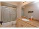 Clean bathroom featuring a shower/tub combo and granite vanity at 664 Little Wekiva Rd, Altamonte Springs, FL 32714