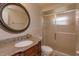 Elegant bathroom with a granite countertop and large mirror at 664 Little Wekiva Rd, Altamonte Springs, FL 32714