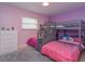 Bright bedroom with a bunk bed and ample closet space at 664 Little Wekiva Rd, Altamonte Springs, FL 32714