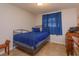 Serene bedroom with a metal bed frame and vintage desk at 664 Little Wekiva Rd, Altamonte Springs, FL 32714