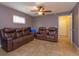 Relaxing living room with brown leather recliners at 664 Little Wekiva Rd, Altamonte Springs, FL 32714