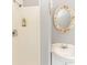 Small bathroom with shower, vanity, and decorative mirror at 1269 Buccaneer Ave, Deltona, FL 32725