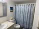 Clean bathroom with a shower/tub combo and modern vanity at 2202 Key West Ct # 632, Kissimmee, FL 34741
