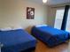 Spacious bedroom featuring two beds and ample natural light at 2202 Key West Ct # 632, Kissimmee, FL 34741