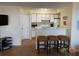 Kitchen with breakfast bar and white cabinets at 2202 Key West Ct # 632, Kissimmee, FL 34741