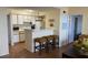 Kitchen with breakfast bar, microwave, and refrigerator at 2202 Key West Ct # 632, Kissimmee, FL 34741
