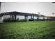 Ranch style home with brick exterior and large yard at 3555 E Johnson Ave, Haines City, FL 33844