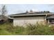 Brick home side view, showing a garage at 3555 E Johnson Ave, Haines City, FL 33844