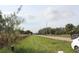 Property view from the road, showing grassy area at 3555 E Johnson Ave, Haines City, FL 33844