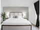 Spacious bedroom with king-size bed and neutral decor at 397 Madison Dr, Davenport, FL 33837
