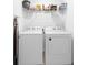 Practical laundry room with washer and dryer at 397 Madison Dr, Davenport, FL 33837