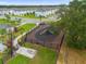Community playground with slide and play area, perfect for children at 397 Madison Dr, Davenport, FL 33837